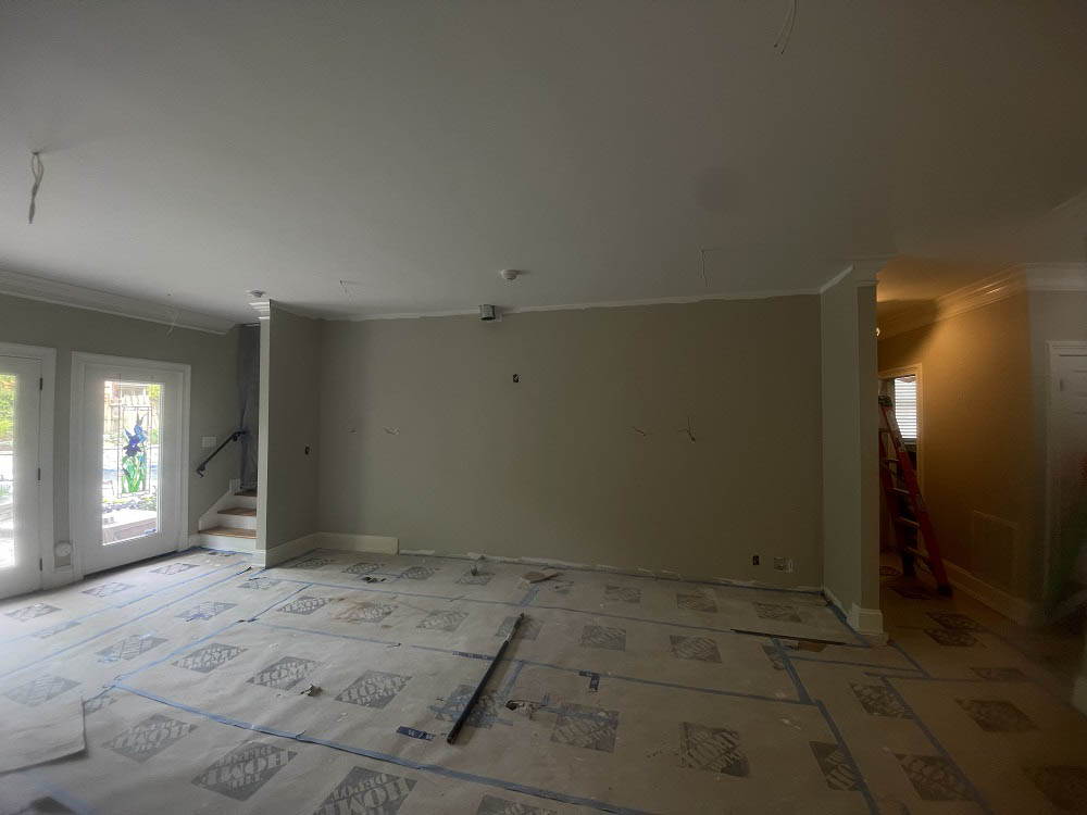 empty kitchen that has been repainted during remodel